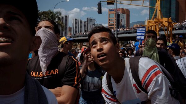 Underexposed Atlantic depiction of a crowd in Venezuela